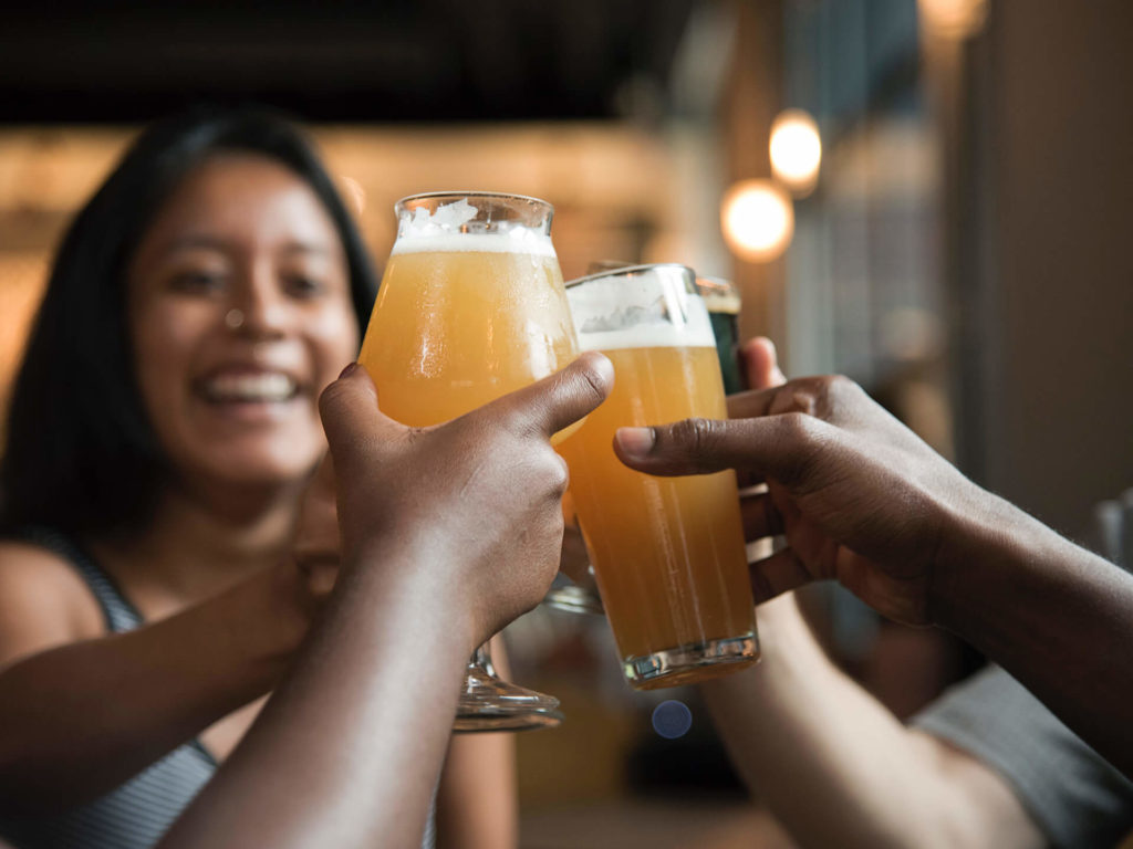 Friends Celebrating with drinks
