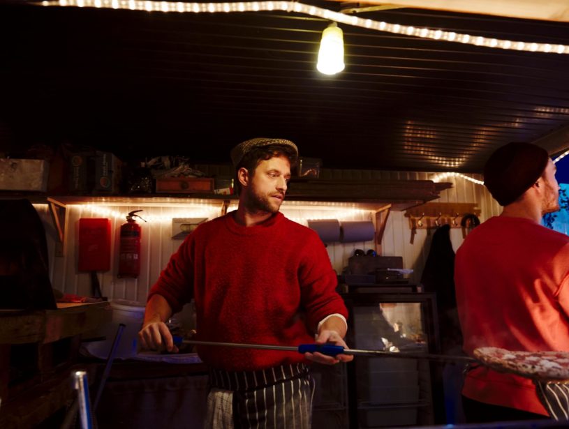 Serving a Coke Lane Pizza at Frank Ryans Bar