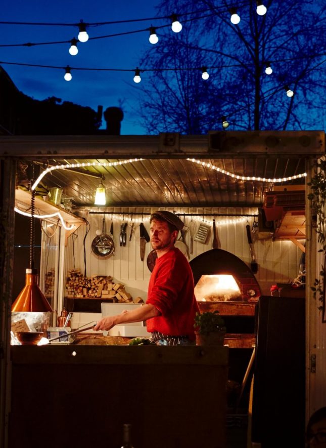 View of the preparation of Coke Lane Pizza at Frank Ryans Bar